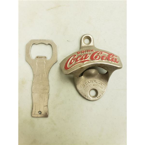 TWO COCA COLA BOTTLE OPENERS