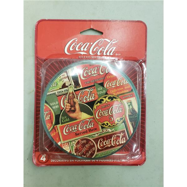 FOUR DECORATIVE COCA COLA COASTERS