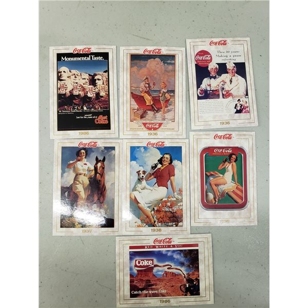 SEVEN COCA COLA CARDS FROM VARIOUS YEARS