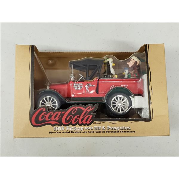 COCA COLA DIE CAST REPLICA OF1918 PICK UP WITH ELF AND PENGUINS
