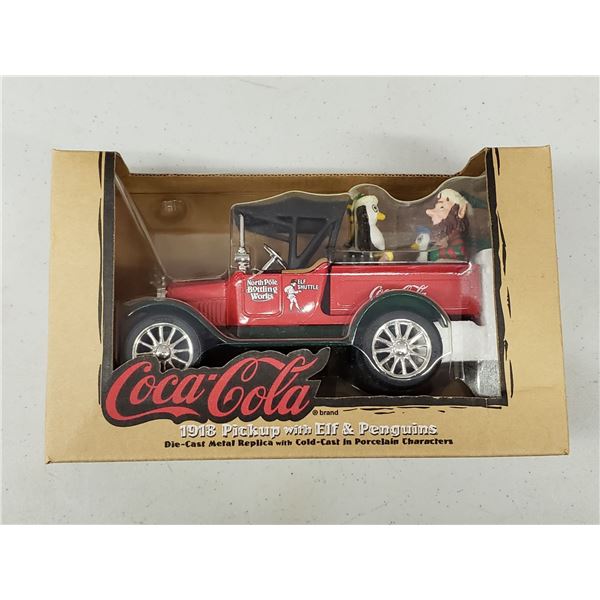 COCA COLA DIE CAST REPLICA OF1918 PICK UP WITH ELF AND PENGUINS