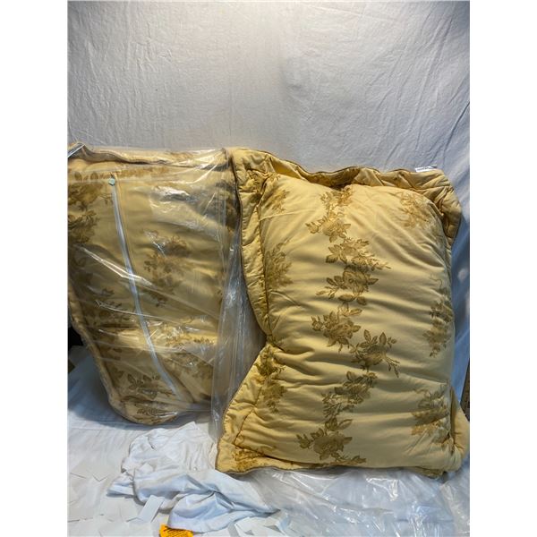 Two Christian Aujard pillow covers wit pillow inside