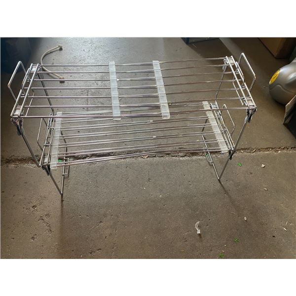 Adjustable shoe or bathroom shelf