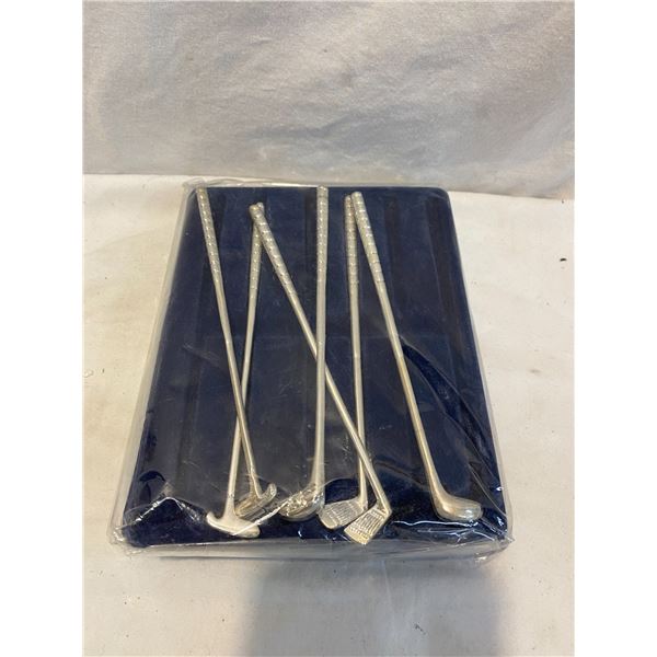 Mini golf clubs maybe stir stick?