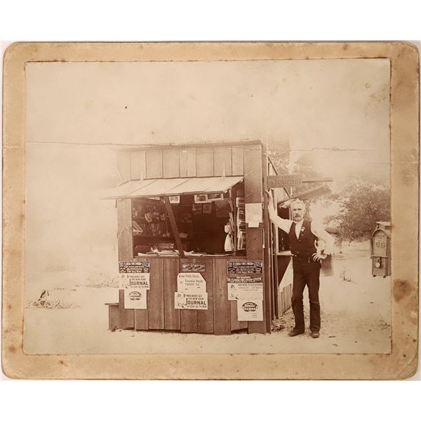 Mounted Photograph of Newspaper Shop Stand  [135730]