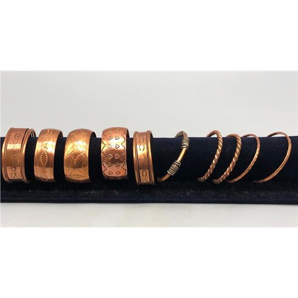 Group of Ten Copper Bracelets