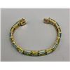 Image 4 : 14k Gold Topaz and Peridot Tennis Bracelet