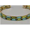 Image 6 : 14k Gold Topaz and Peridot Tennis Bracelet