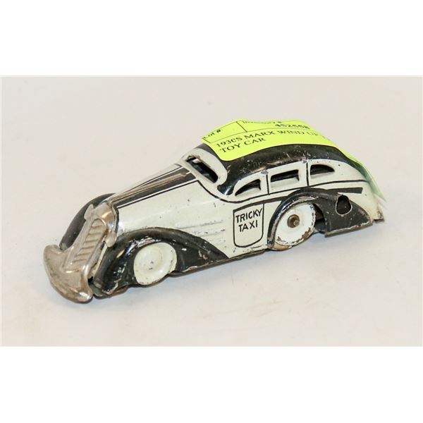 1930S MARX WIND UP TRICKY TAXI TOY CAR