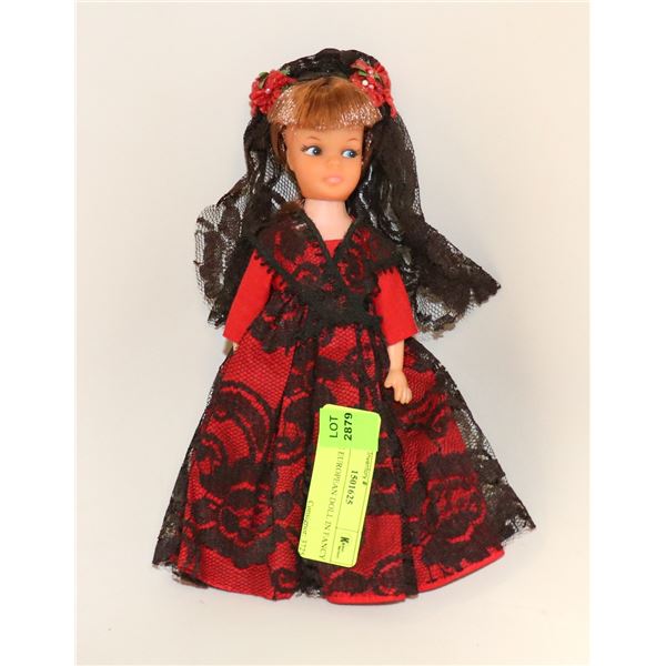 MID SIZE EUROPEAN DOLL IN FANCY DRESS
