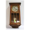 Image 1 : ANTIQUE WOOD CASED WALL CLOCK WITH KEY AND
