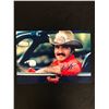 Image 1 : BURT REYNOLDS SIGNED SMOKEY AND THE BANDIT 8 X 10 ( REAL AUTHENTICS COA)
