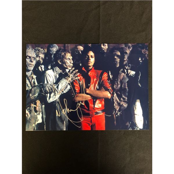 MICHAEL JACKSON SIGNED 8X10 PHOTO (REAL AUTHENTIC COA)