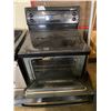 Image 2 : BLACK G.E. ELECTRIC RANGE CONVENTIONAL OVEN MODEL GRSR3920ZSS-1