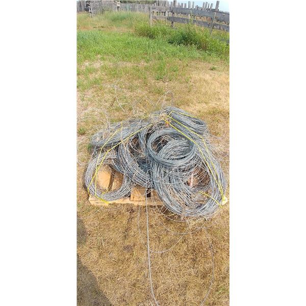 PALLET OF MISC. HIGH TENSILE AND BARBED WIRE