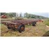 Image 1 : HOME BUILT HEAVY DUTY TRUCK FRAME BALE TRAILER, 7.5X20 DULAS, HAULS 14 ROUND BALES