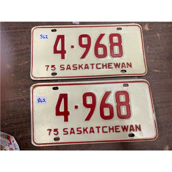 pair 1975 Saskatchean License plated matched with low numbers