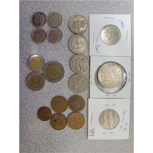 Foreign coins including Swiss silver (1965 5 Franc coin)