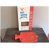 Image 1 : Vintage Canadian made rubber hot water bottle in original box.