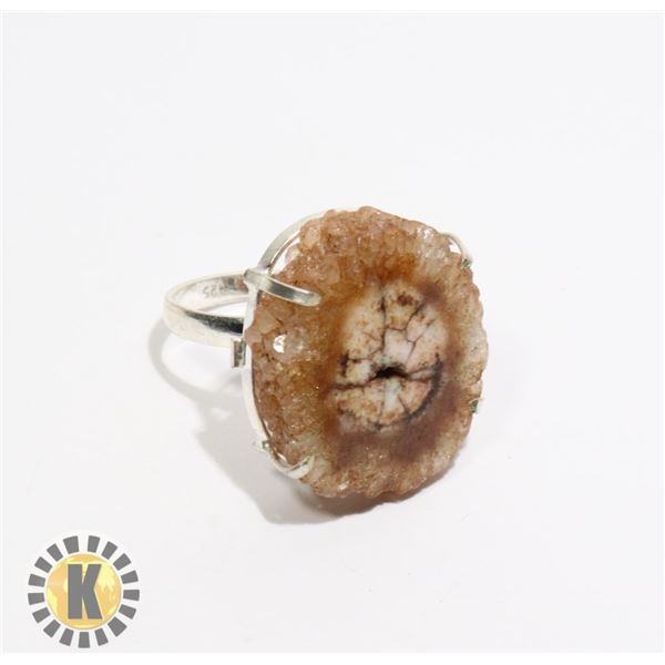 12)  BROWN TONES SOLAR QUARTZ RING SET IN