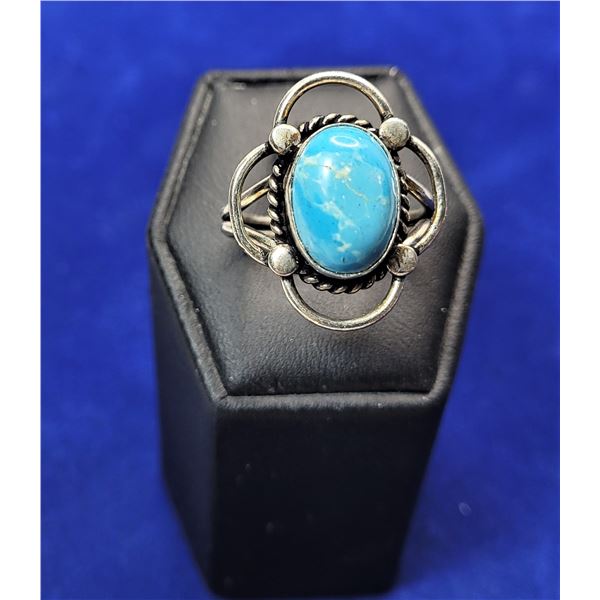 13)  SILVER TONE AND NATURAL LARIMAR RING