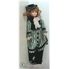 Image 1 : 18" DOLL ON STAND WITH GREEN DRESS
