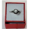25)  SILVER TONE AND ROUND MOONSTONE RING
