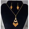 23)  GOLD TONE AND SHADES OF ORANGE PENDANT