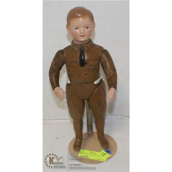 UNCLAIMED MILITARY DOLL