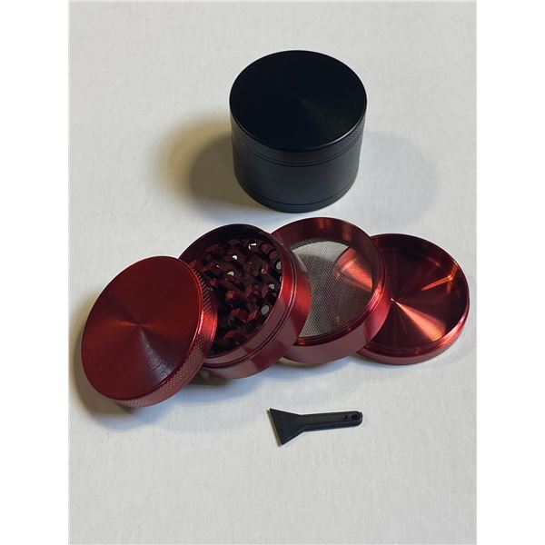 LOT OF TWO HERB GRINDERS - BLACK / RED