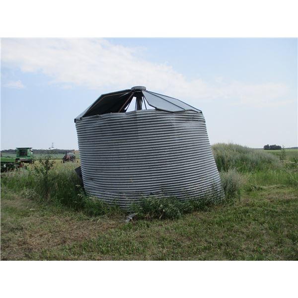 Damaged flat bottom grain bin