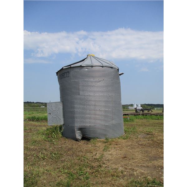 Damaged flat bottom grain bin