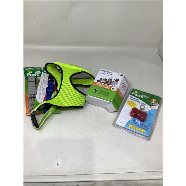 Lot of NEW dog stuff - leash, ID tag, saftey vest, pet waste bags, etc.