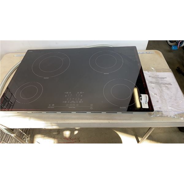 NEW  INDUCTION  TOUCH CONTROL COOKTOP, RETAIL $1,199 NEW, NEVER INSTALLED, AUTO SIZING ELEMENTS,BLAC