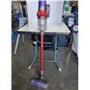 Image 7 : DYSON V10 MOTORHEAD STICK VACUUM, NO CHARGER, WORKS WELL, SHOWS SIGNS OF A DROP, REPAIRED,