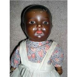 Black composition doll with straw stuffed body #1968276