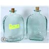 Image 1 : PAIR OF GREEN GLASS DECANTERS