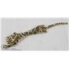 Image 1 : LONG TIGER BROOCH WITH GREEN EYES