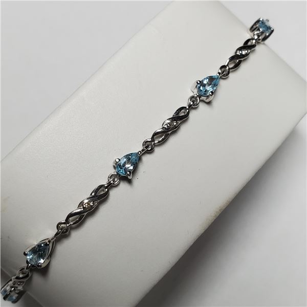 T120 SILVER BLUE TOPAZ DIAMOND BRACELET