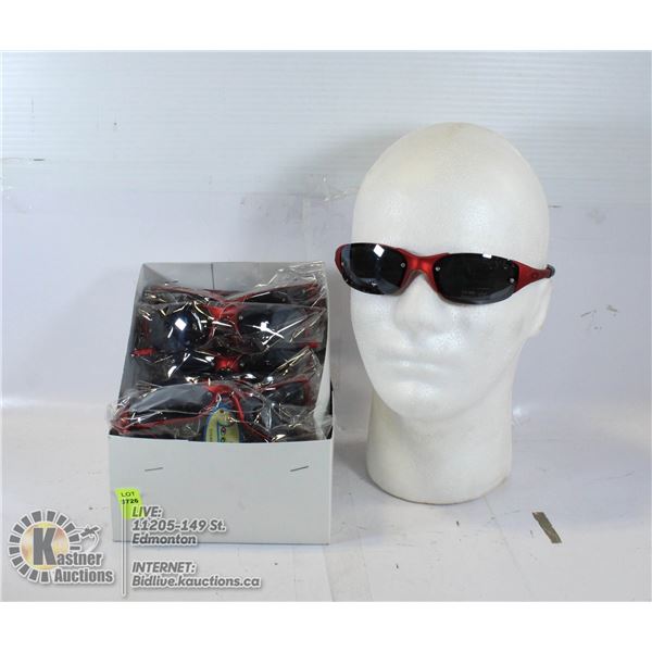 BOX OF SLEEK RED SUNGLASSES. 100% UV PROTECTION.