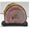 Image 1 : LARGE PINK AGATE GEODE ON WOOD BASE