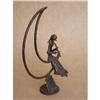 Image 1 : Modern Sculpture Girl Playing Flute on the Moon#1955962