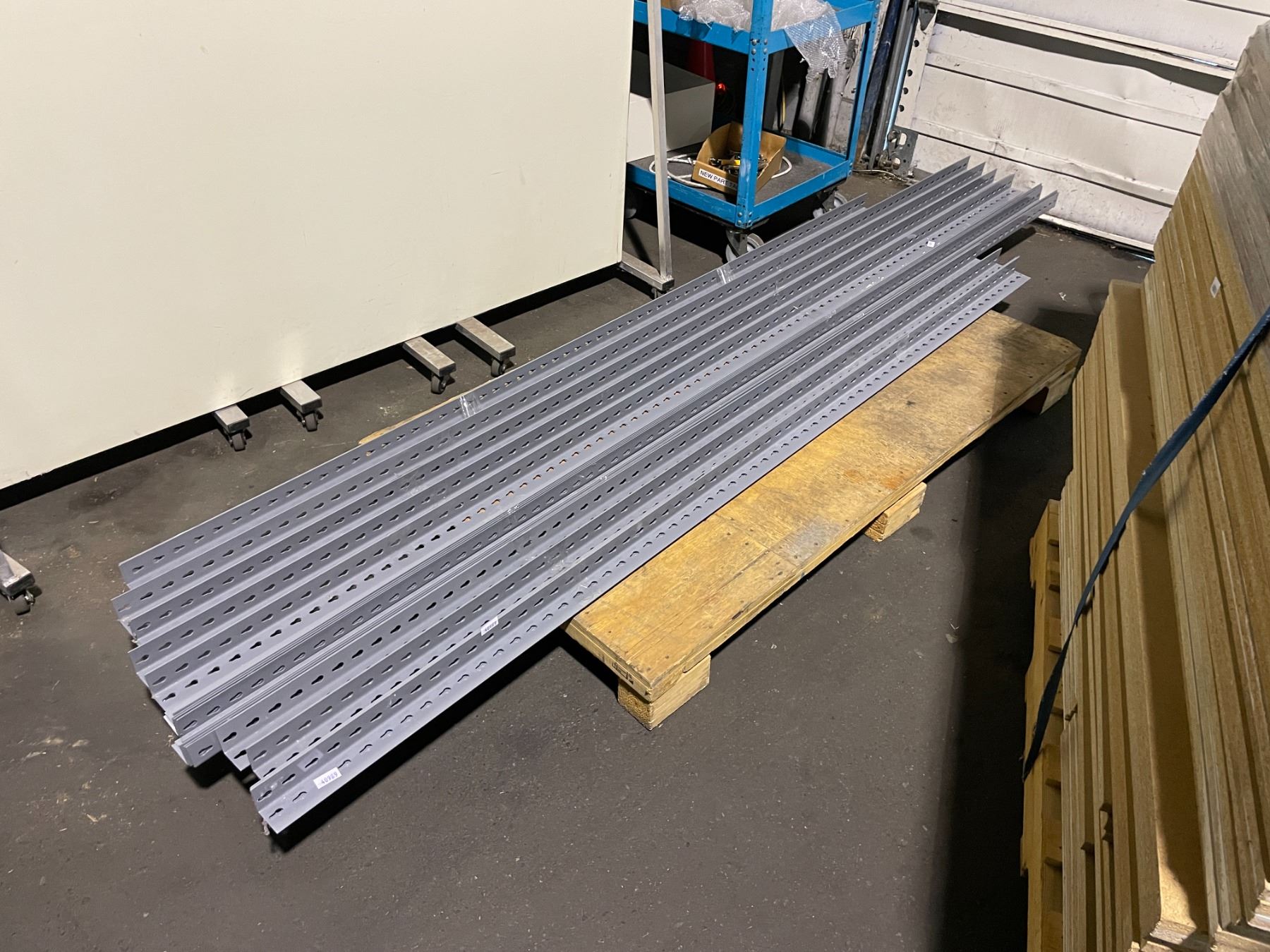 PALLETS OF GREY ULINE ADJUSTABLE METAL / WOOD RACKING SYSTEMS