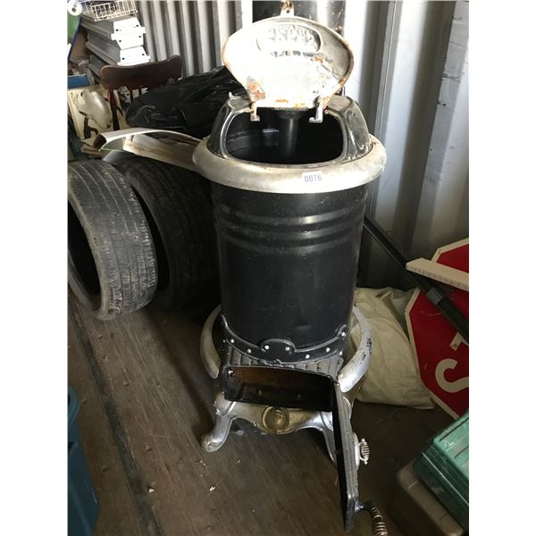 Coles Hot Blast Stove - Beck Auctions Inc.