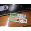 Image 5 : singer sewing machine in cabinet with attachments