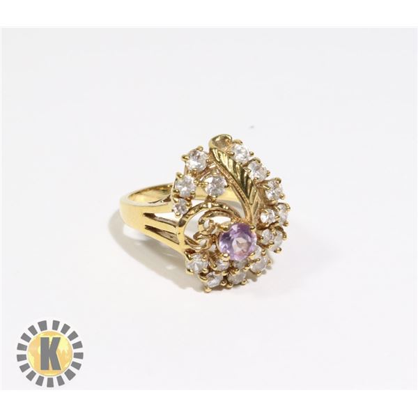 925-136 GOLD COLOUR  BAND W/ CRYSTALS & 1 PURPLE STONE,