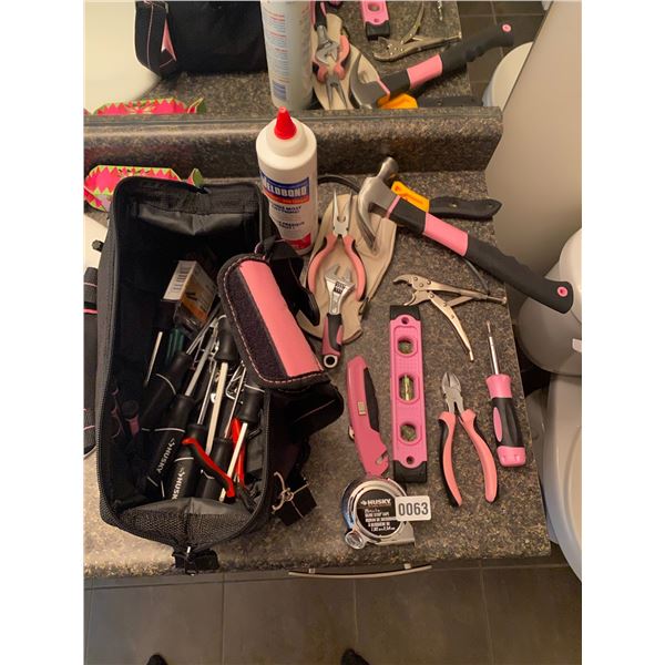 Pink Tool Bag with Various Tools