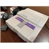 Image 2 : Super Nintendo Entertainment System with controllers and adapter