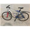 Image 1 : BLUE AND SILVER DEVINCI COYOTE 21 SPEED, 19" FRAME, FRONT SUSPENSION MOUNTAIN BIKE