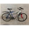 Image 2 : BLUE AND SILVER DEVINCI COYOTE 21 SPEED, 19" FRAME, FRONT SUSPENSION MOUNTAIN BIKE